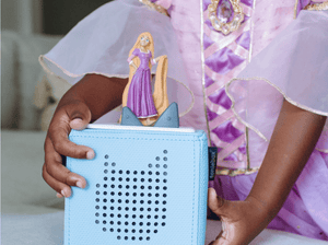 Child Playing With Enredados Audio Figurine And Toniebox 2