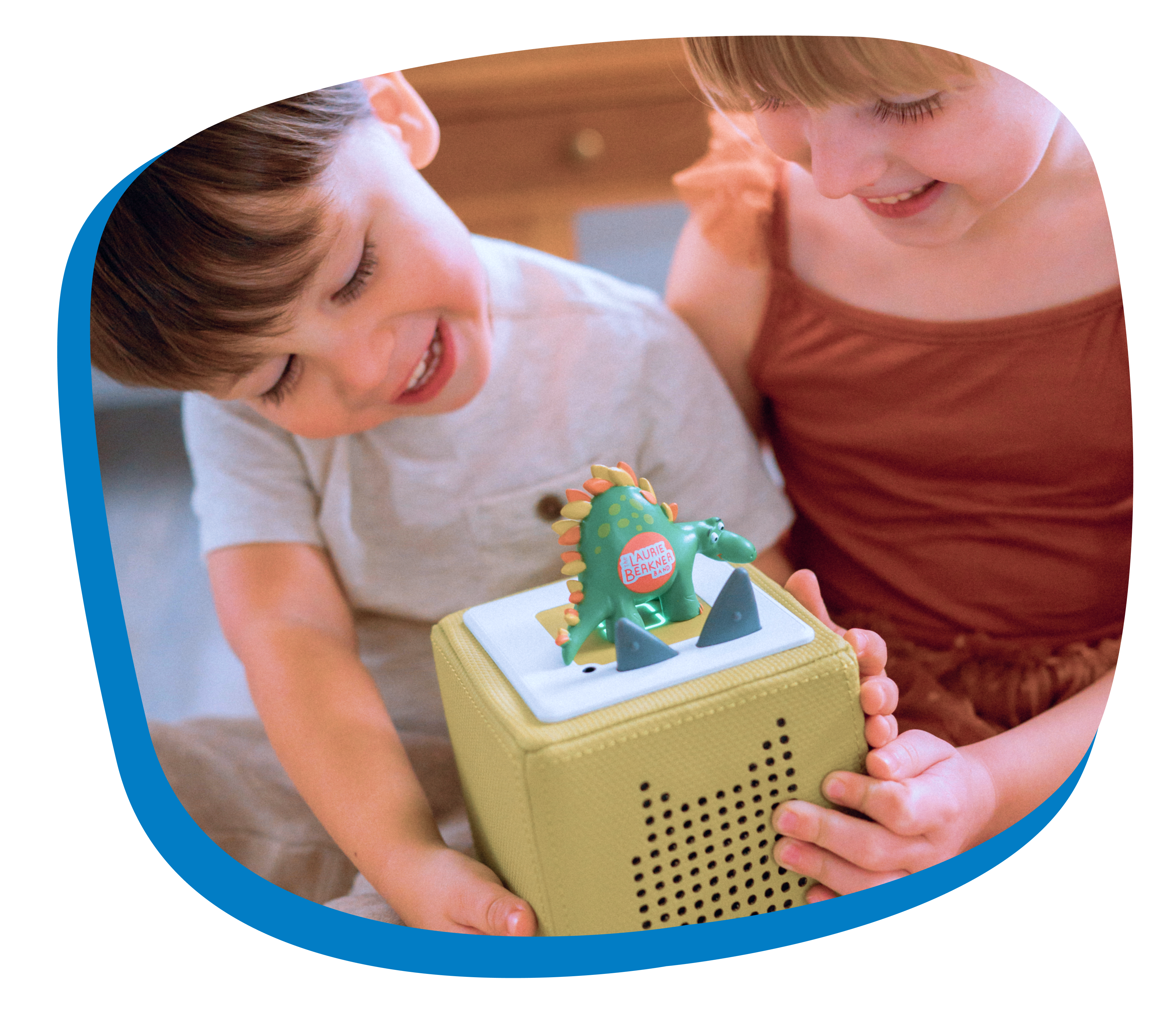 kids playing with a laurie berkner tonie on a green toniebox