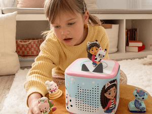 Child Playing With A Pink Toniebox 2 And Gabby'S Dollhouse Tonies In A Gabby'S Dollhouse Sleeve