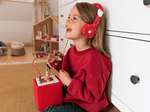 Child using with Red Headphones for Kids