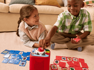 two children play with a toniebox 2 and Tonieplay Guess Who Monster Mysteries