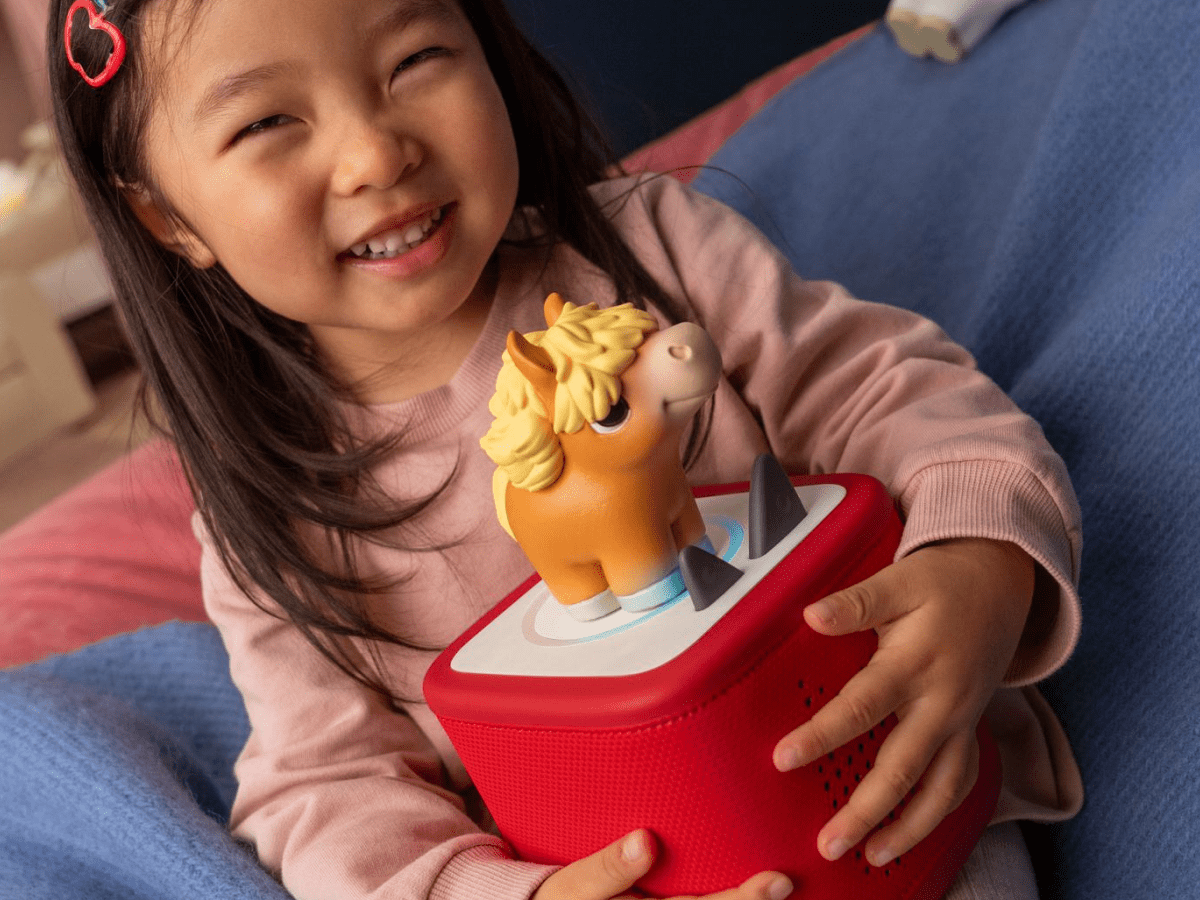 Child playing with My First Tonies Horse audio figurine and Toniebox 2