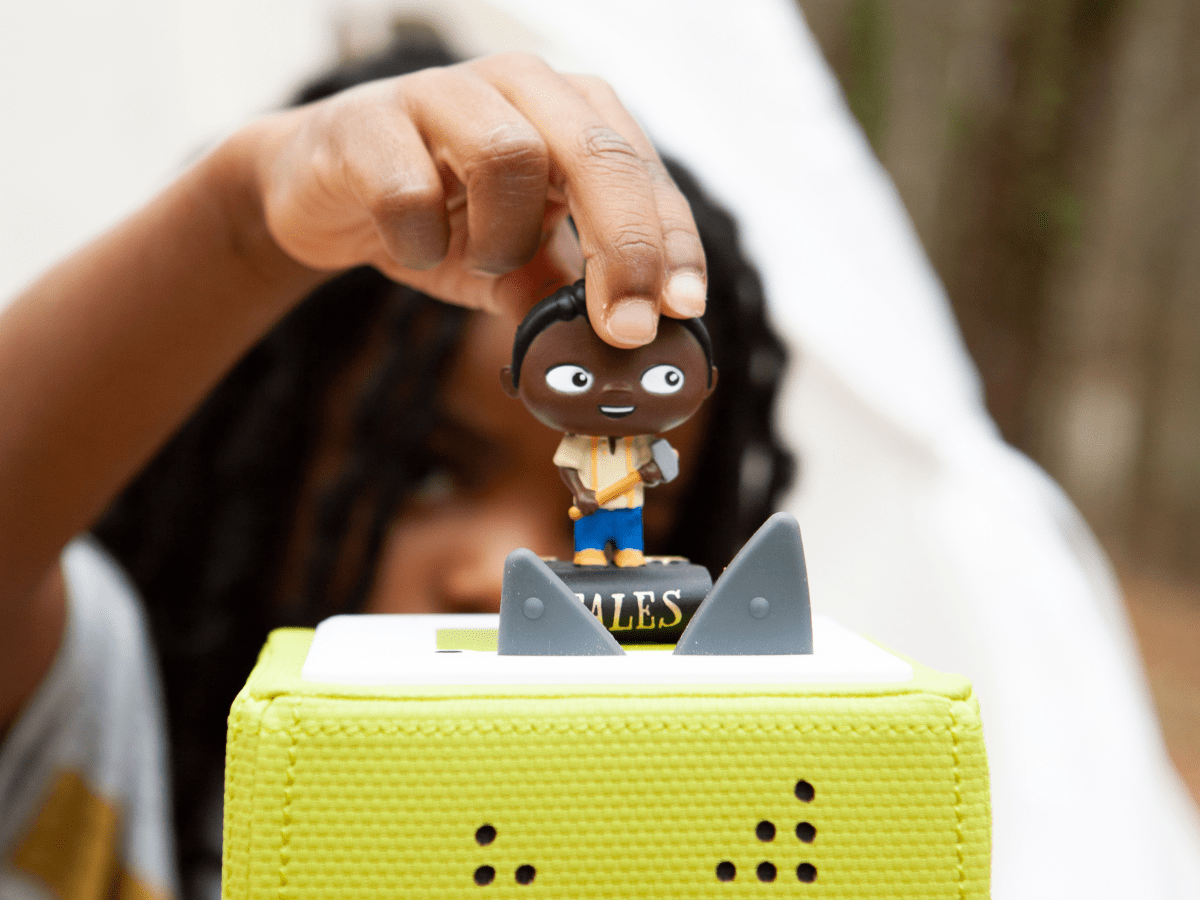 Child Playing With Favorite Tales: John Henry And Other Stories Tonie