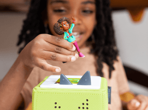 Child Playing With Karma'S World Tonie