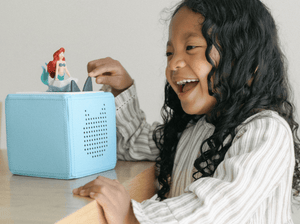 Child Playing With Disney The Little Mermaid Tonie