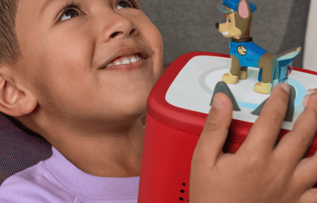 Child listening to PAW Patrol Tonie on a red Toniebox 2