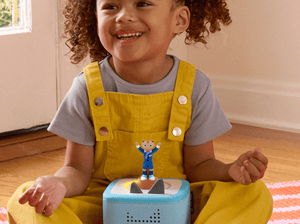 child playing with a toniebox 2 and Laurie Berkner 3- Harry The Chipmunk's Treasure Hunt Tonie