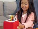 Child Playing With Lunar New Year Audio Figurine And Toniebox 2