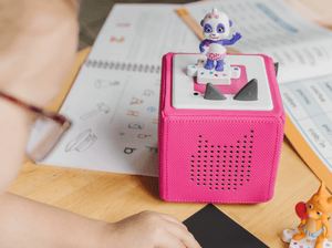 Child Playing With Word Party Presents: Math! Tonie