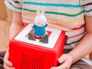Child Playing With Miffy Tonie