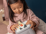 Child enjoying a Tonie and Toniebox 2, an audio player for kids