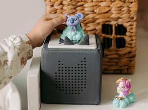 Child Playing With Moshi- Sleepy Paws Tonie Audio Figurine And Toniebox 2