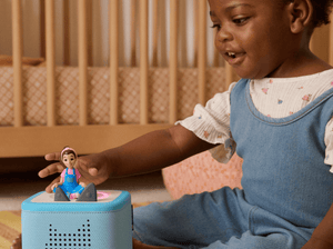 Child Playing With Sky Blue Toniebox 2 Starter Set With Ms. Rachel Tonie