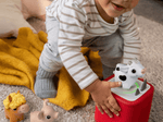 Child playing with my first tonie cow audio figurine and Toniebox 2