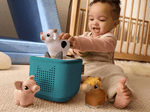 child playing with toniebox 2 and my first tonies horse, cow and pig