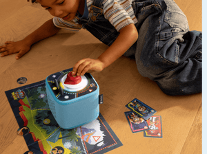 Child playing wth Tonieplay PAW Patrol Dino Movie Dino Island Rescue Mission and a toniebox 2