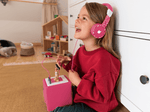 Child using with Pink Headphones for Kids