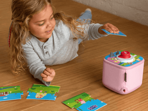 child playing with Tonieplay Peppa Pig-Playdate with Peppa and a pink toniebox 2