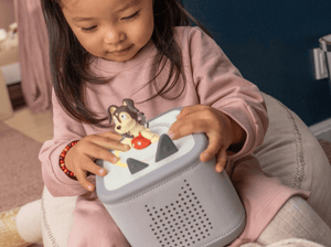 Child Enjoying A Tonie And Toniebox 2, An Audio Player For Kids