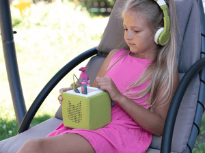 Child Playing With Trolls: Poppy Tonie