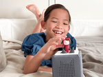 Child Playing With Purple With Light Hue Creative-Tonie