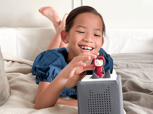 Child Playing With Purple With Light Hue Creative-Tonie