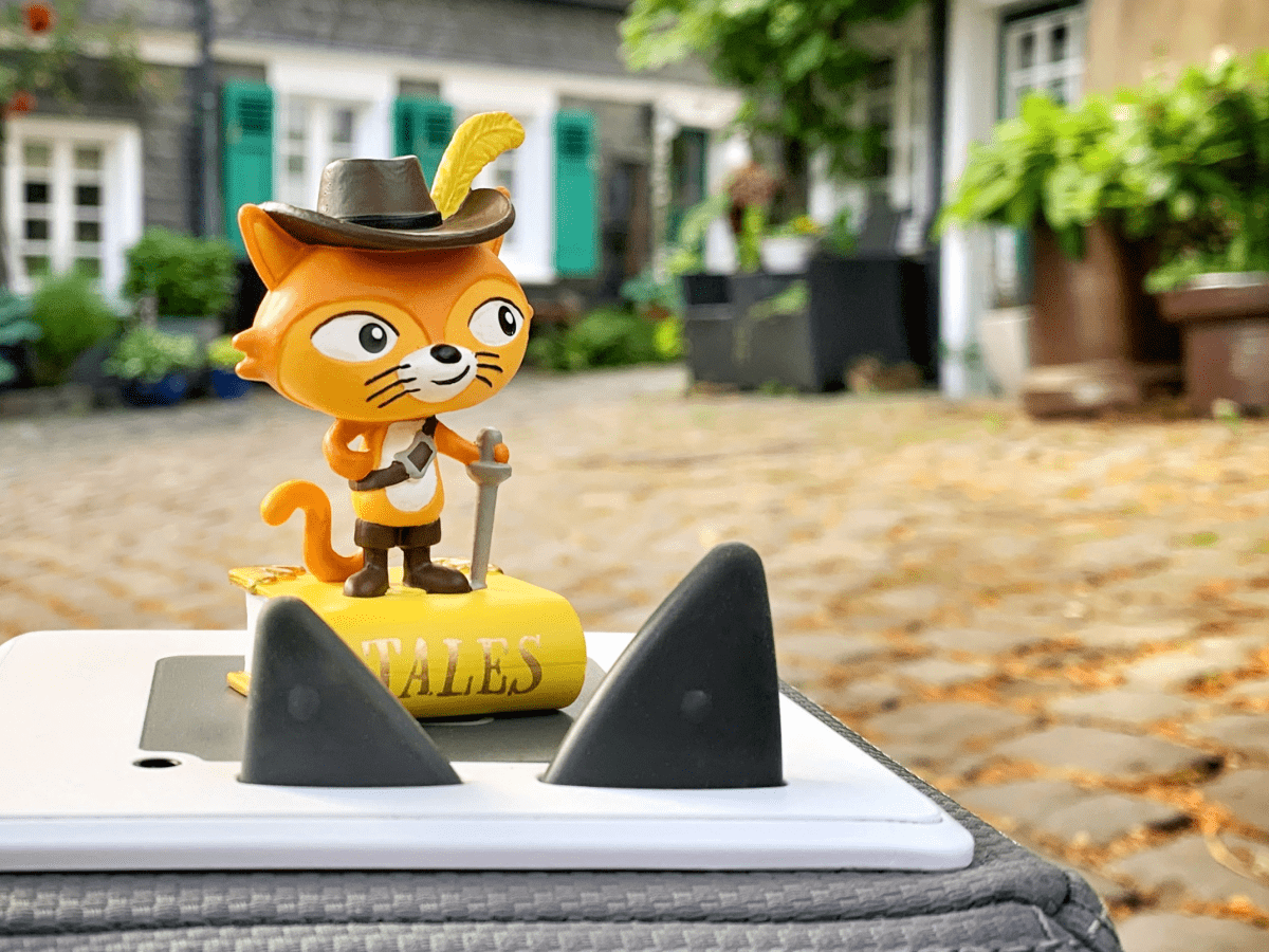 Child Playing With Favorite Tales: Puss In Boots Tonie