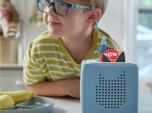 Child Playing With Wow In The World - Reggie Tonie Audio Figurine And Toniebox 2
