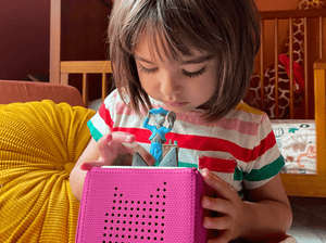 Child Playing With Roald Dahl: Revolting Rhymes Tonie