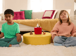Child Playing With Yoga Tonie  Audio Figurine And Toniebox 2