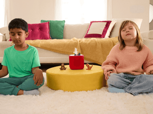 Child Playing With Yoga Tonie  Audio Figurine And Toniebox 2