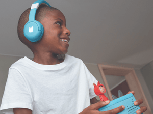 Child Listening To The Toniebox 2 And Tonie With Sky Blue Bluetooth Headphones For Kids