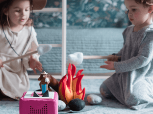 Child Playing With Smokey Bear Tonie