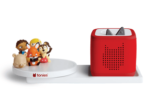 Red Toniebox 2 on rotating shelf with various Tonies