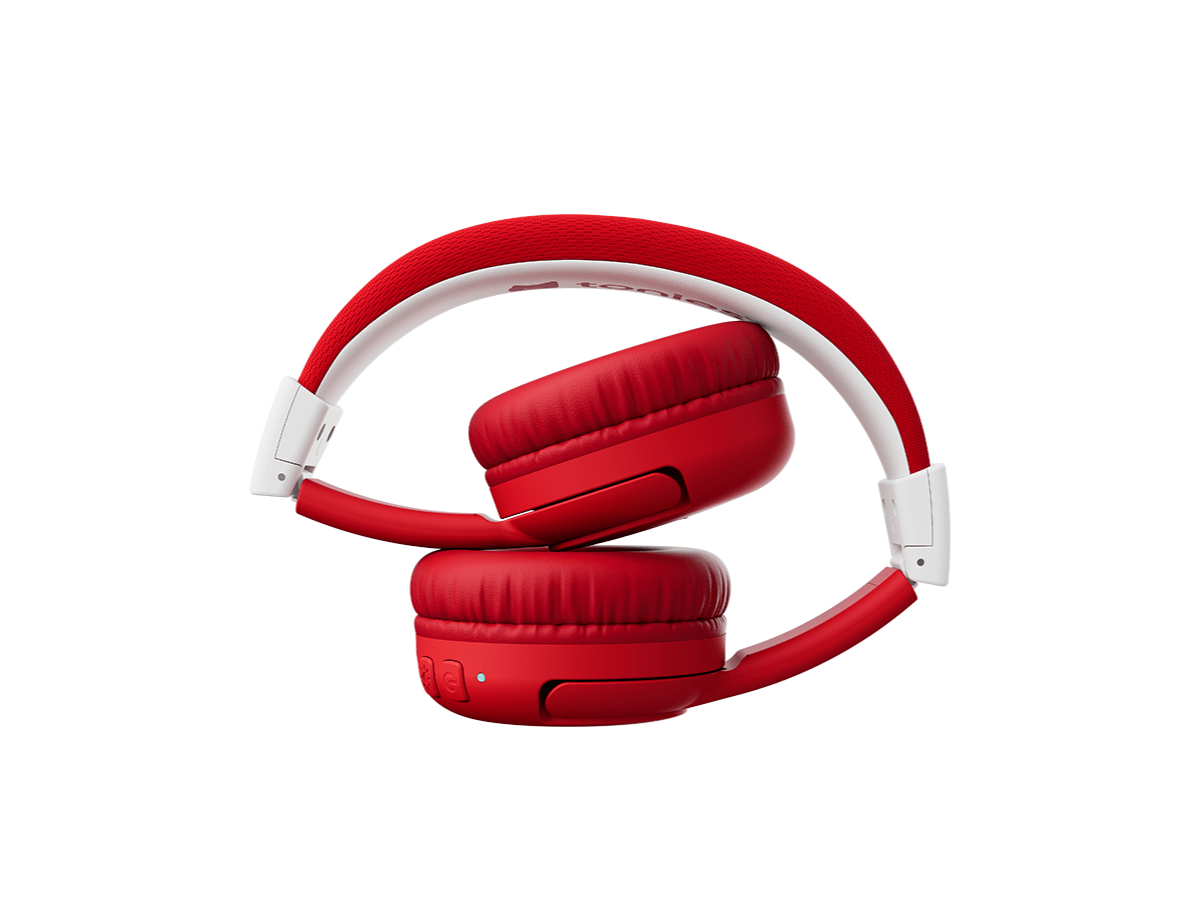sunset red bluetooth headphones for kids in a folded position