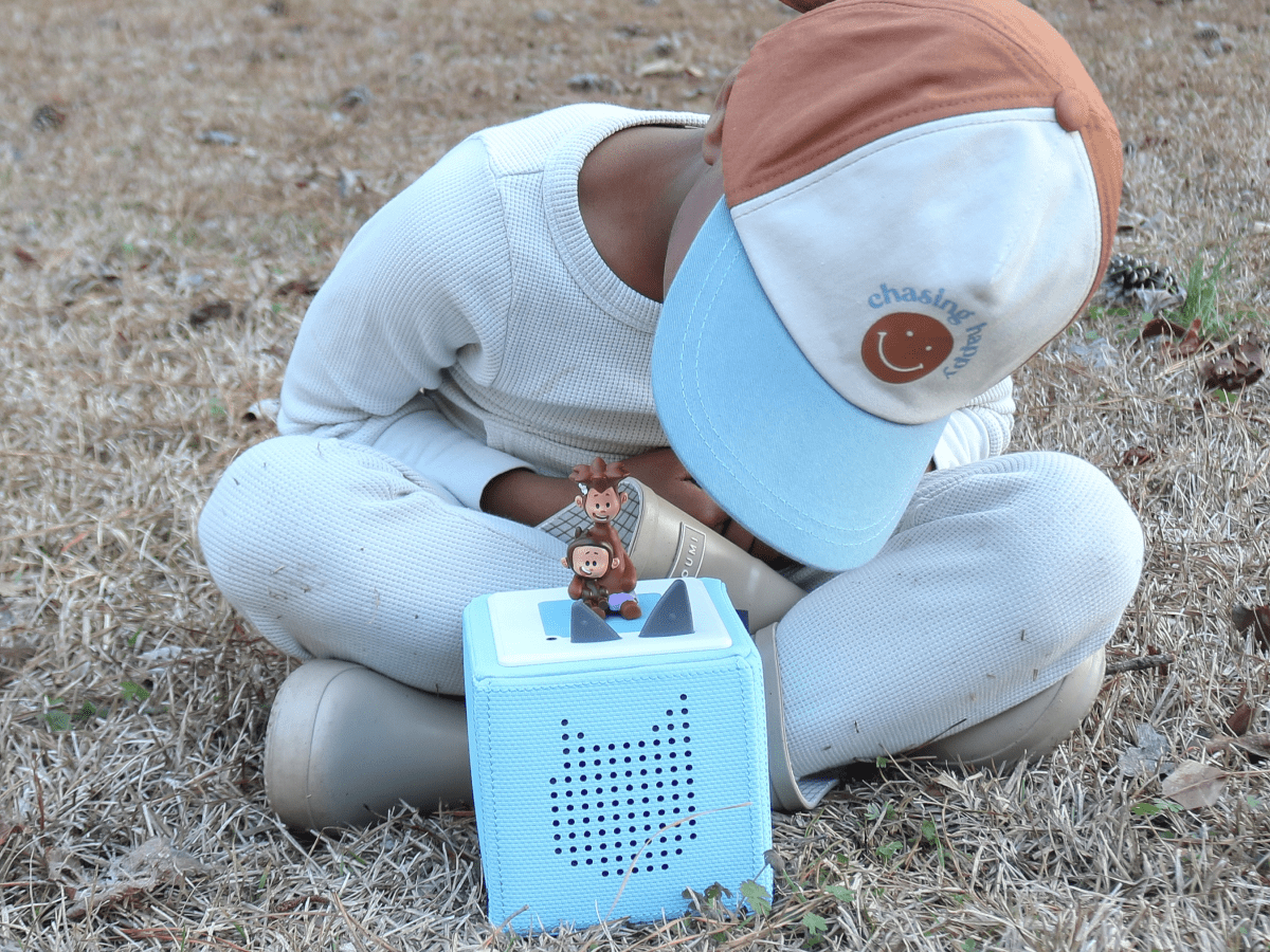 Child Playing With Tee And Mo Tonie