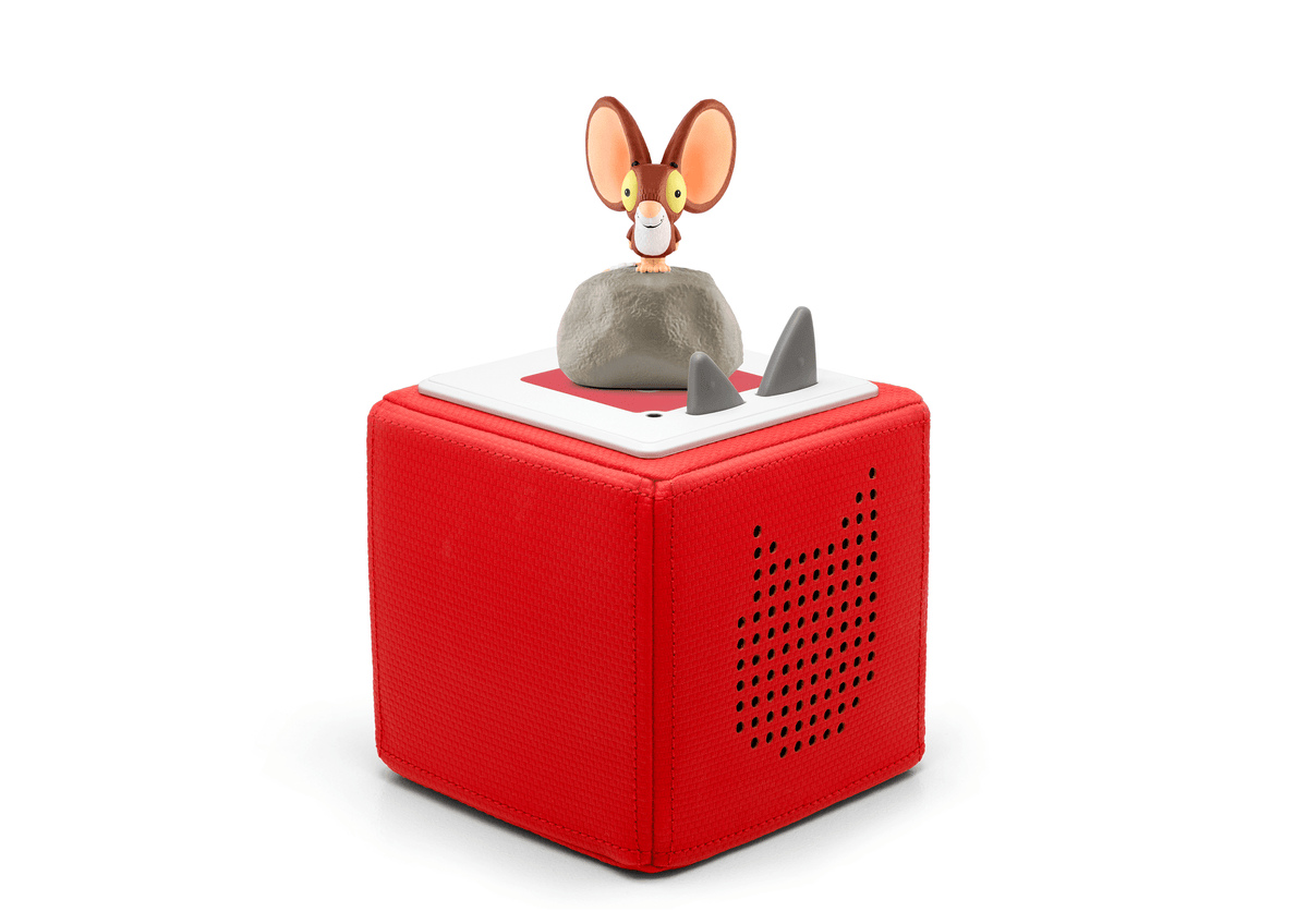 Full view of a The Lion Inside Tonie on a red Toniebox