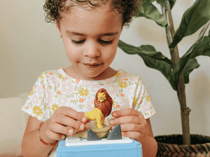 Child Playing With Disney The Lion King Tonie