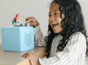 Child Playing With Disney The Little Mermaid Tonie