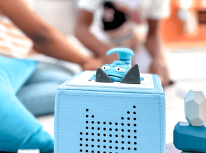 Child Playing With The Pout-Pout Fish Tonie