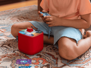 Kids Playing With A Red Toniebox 2 And The Quizzles Technology Tonieplay