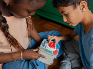 Kids Playing With A Red Toniebox 2 And Time Academy Toniplay