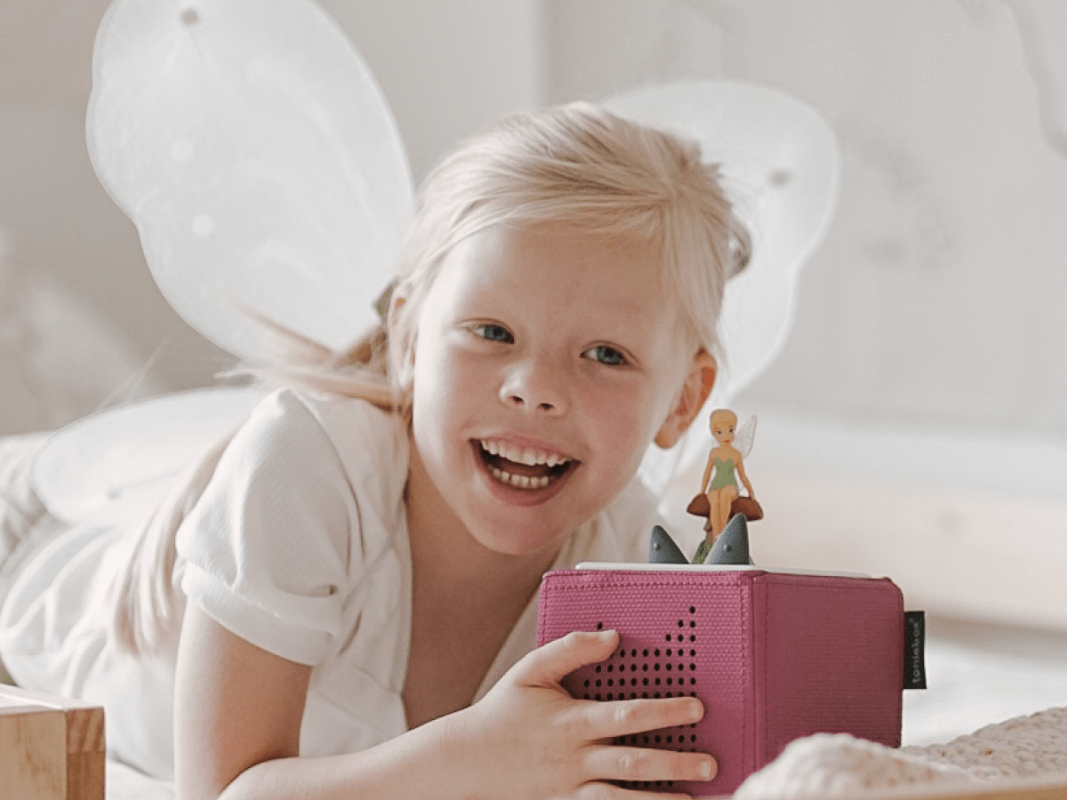 Child Playing With Disney Tinker Bell Tonie