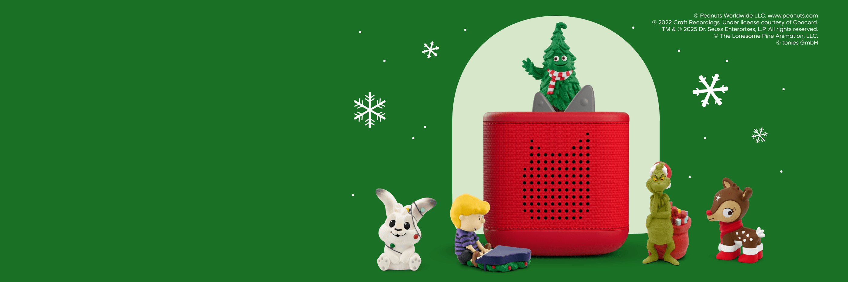 holiday tonies on a red toniebox 2 with snowflake background
