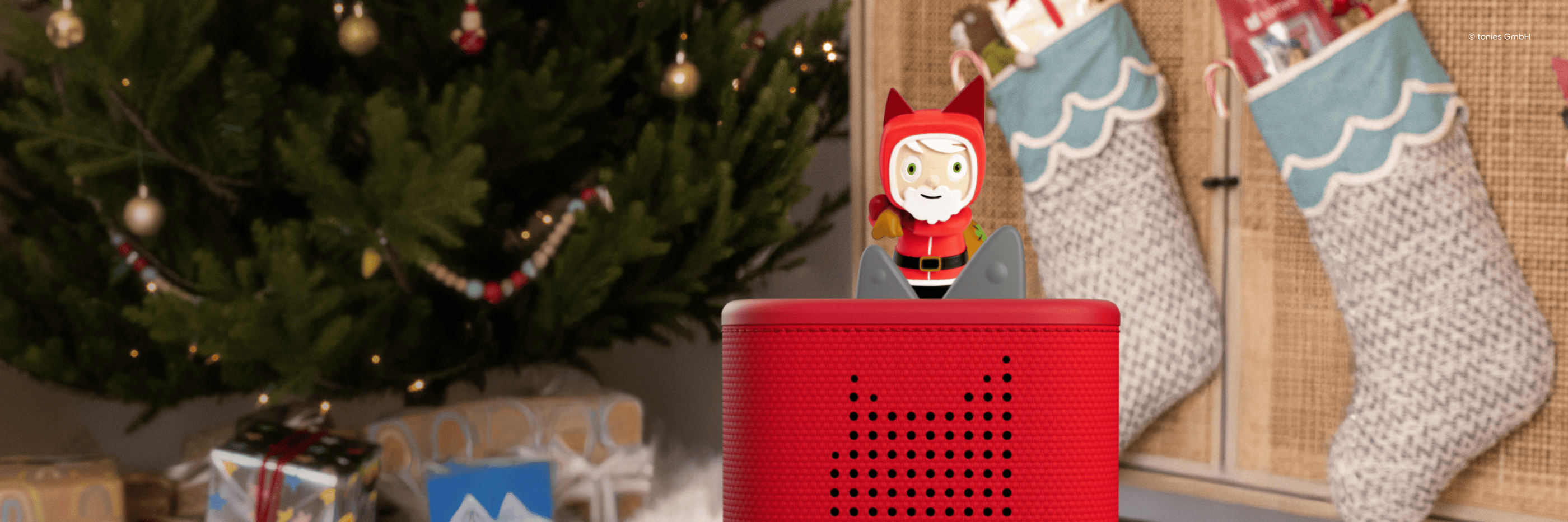 Santa Creative Tonie on a red Toniebox 2 under a Christmas tree
