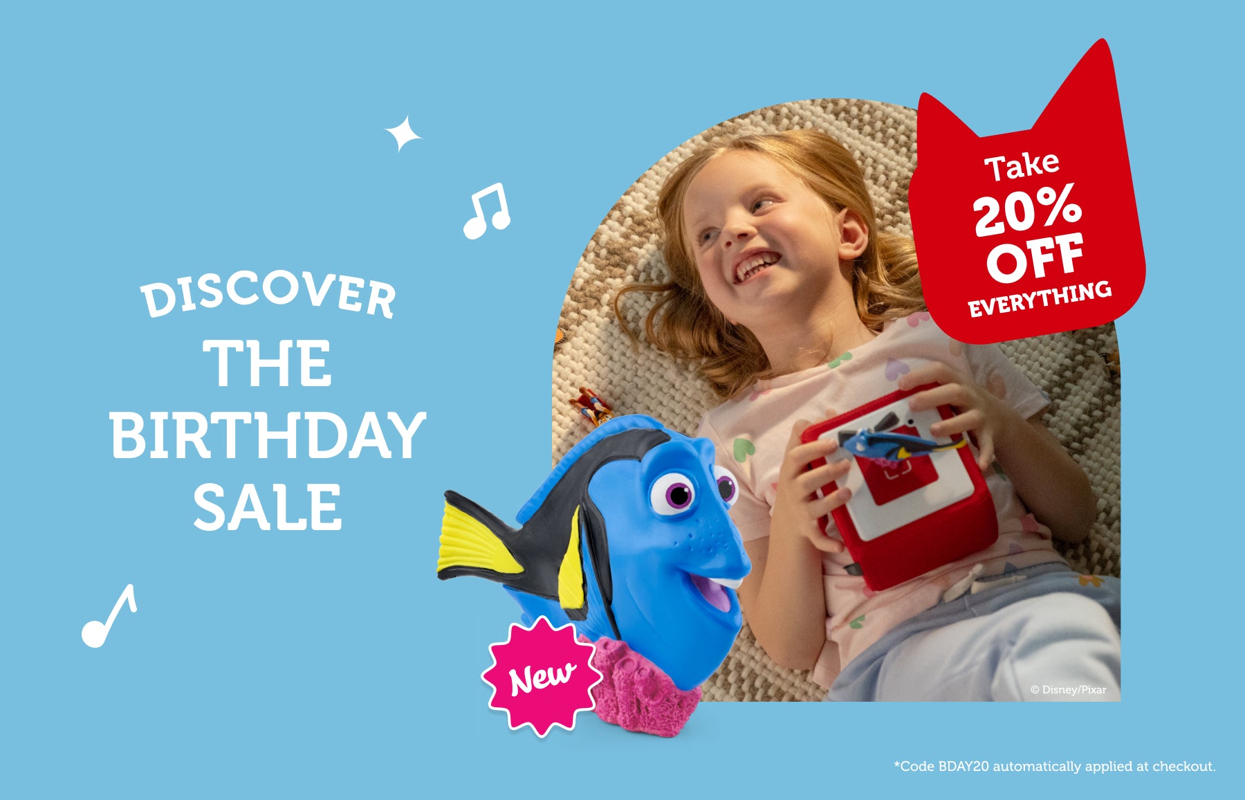 child playing with finding dory tonie and a red toniebox