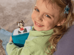 Child enjoying a Tonie and Toniebox 2, an audio player for kids