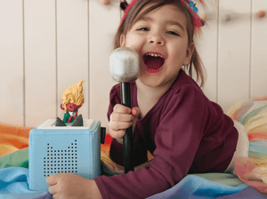 Child Playing With Trolls: Viva Tonie