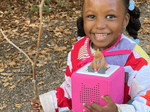 Child Playing With We'Re Going On A Bear Hunt Tonie