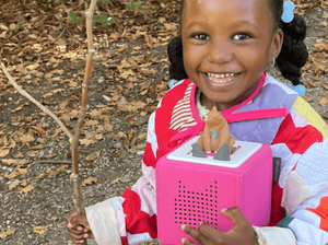 Child Playing With We'Re Going On A Bear Hunt Tonie